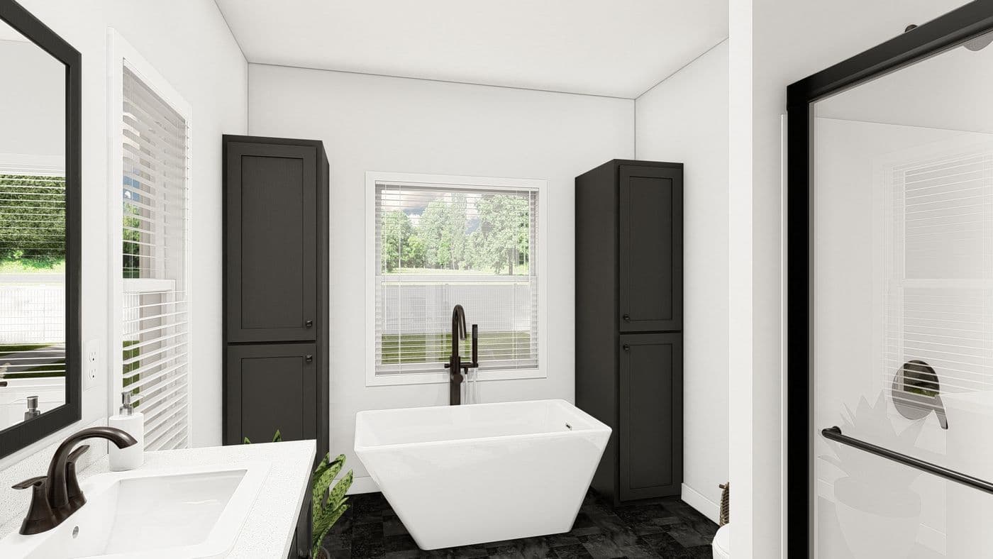 The ING621K TAMARACK GW Primary Bathroom. This Manufactured Mobile Home features 3 bedrooms and 2 baths.
