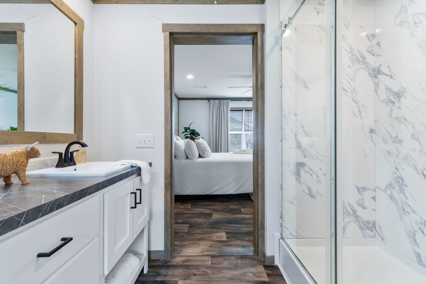 The SAWYER ELITE Primary Bathroom. This Manufactured Mobile Home features 3 bedrooms and 2 baths.