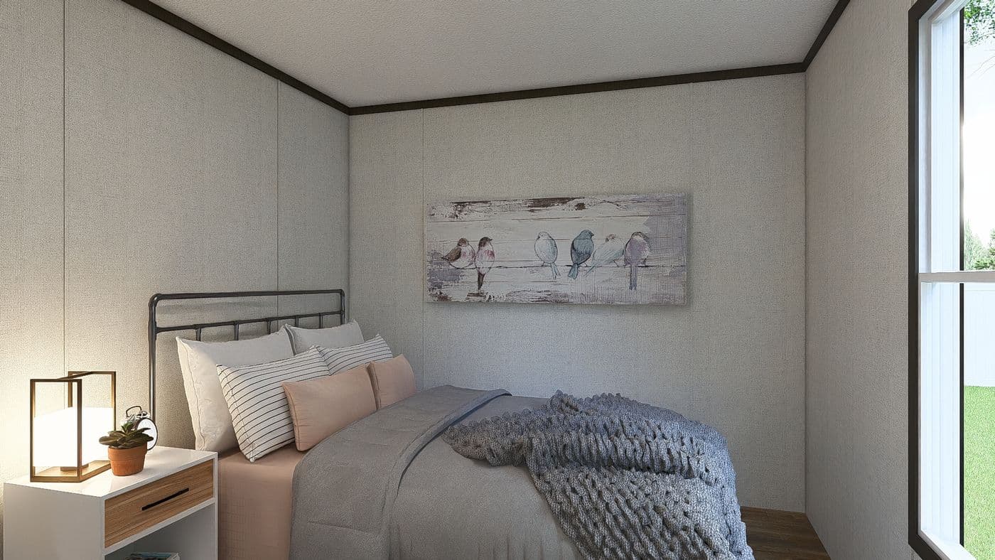 The GLIMPSE Guest Bedroom. This Manufactured Mobile Home features 3 bedrooms and 2 baths.