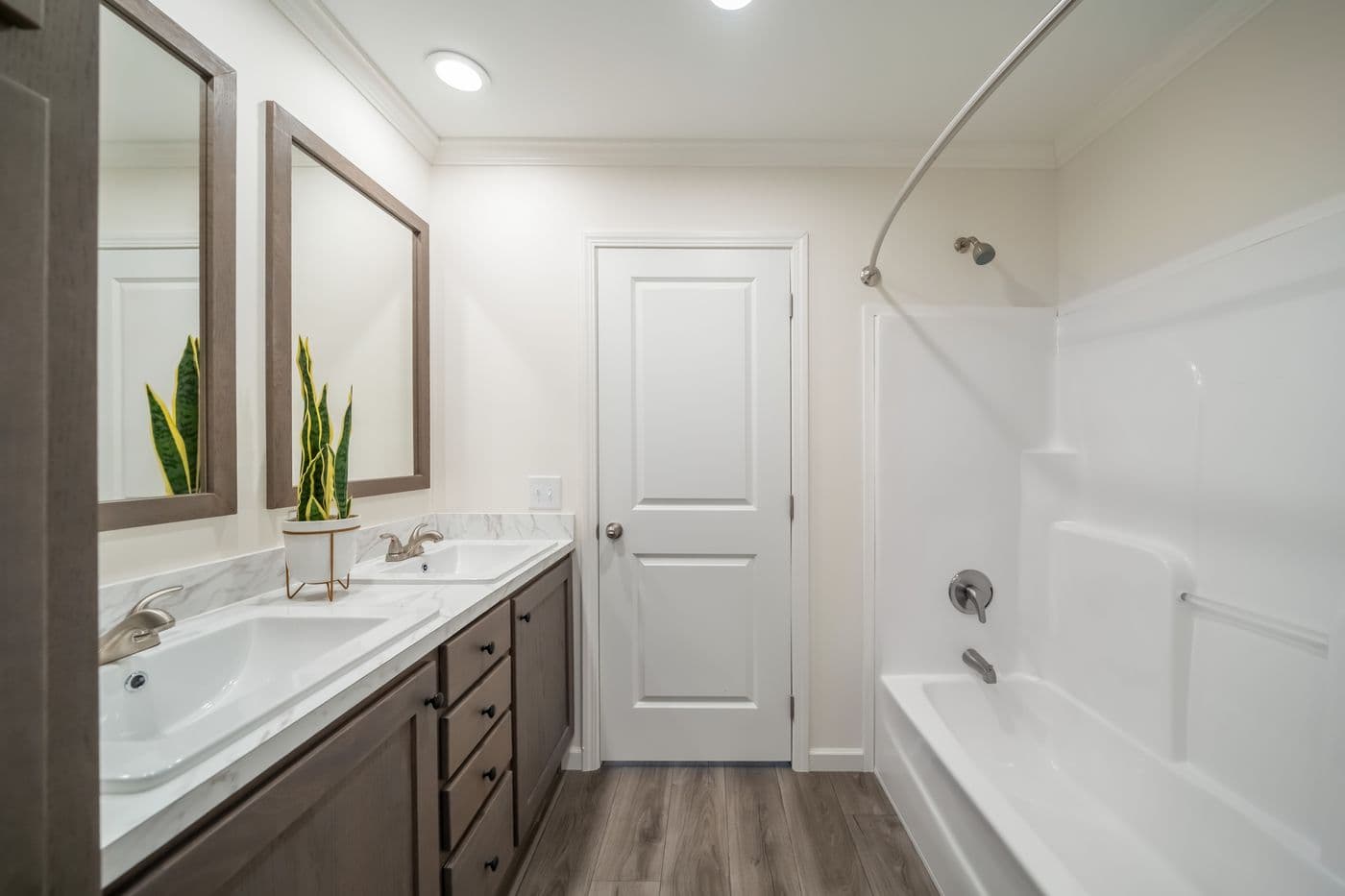 The 4200 "SOUTHPORT" 58'4X16 Primary Bathroom. This Manufactured Mobile Home features 2 bedrooms and 2 baths.