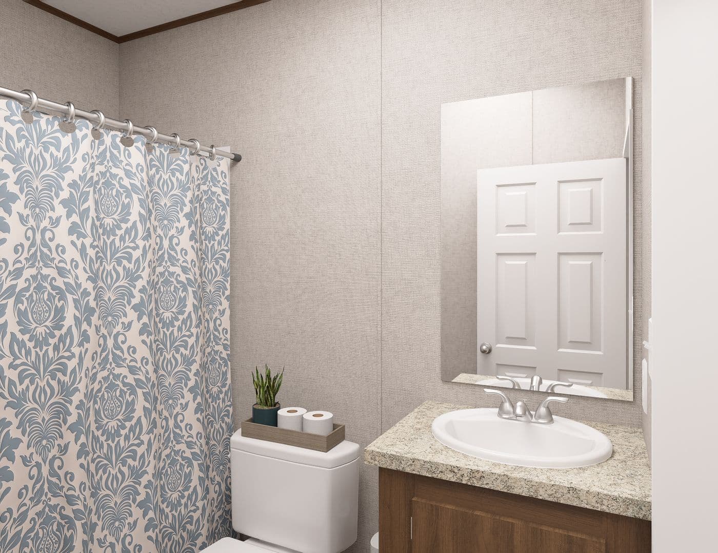 The ASPEN Guest Bathroom. This Manufactured Mobile Home features 3 bedrooms and 2 baths.