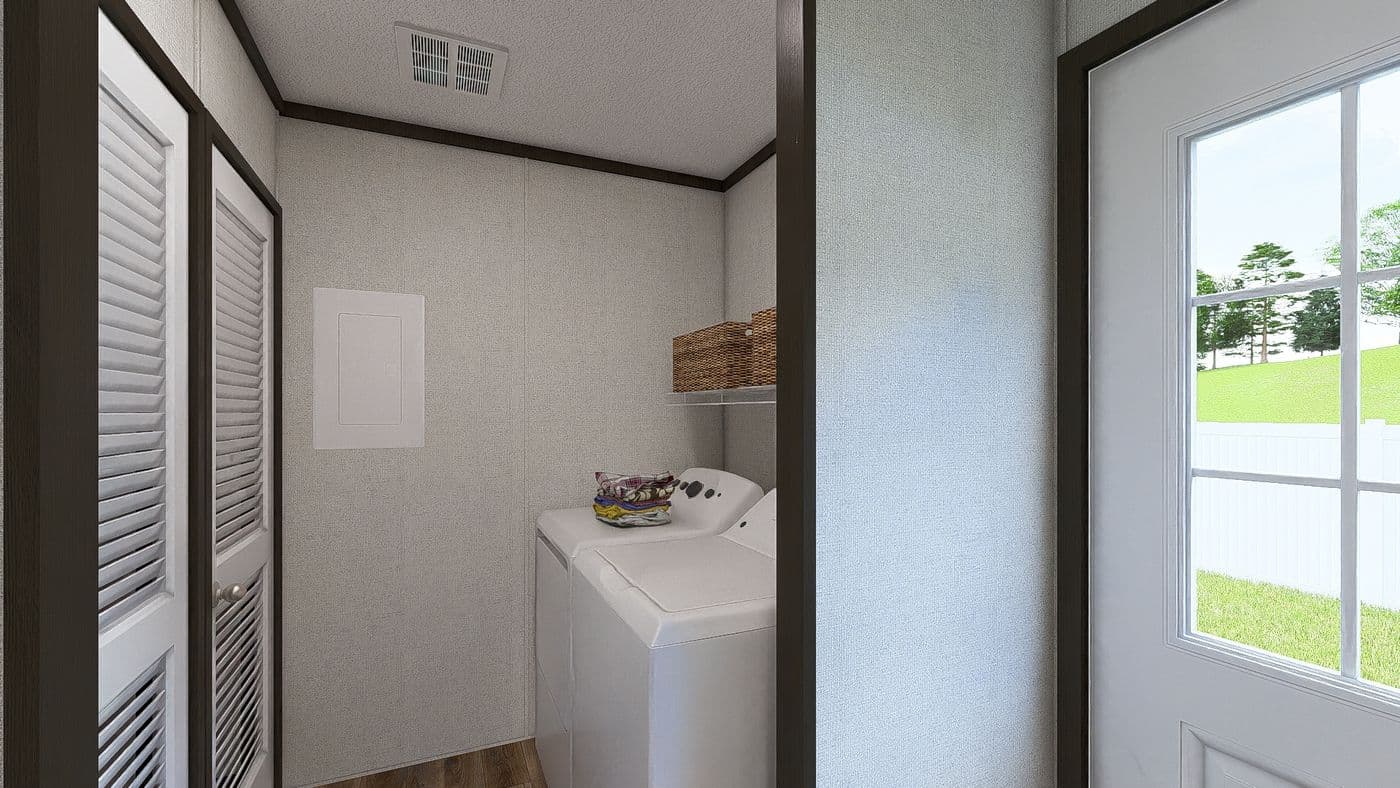 The ESSENCE Utility Room. This Manufactured Mobile Home features 3 bedrooms and 2 baths.