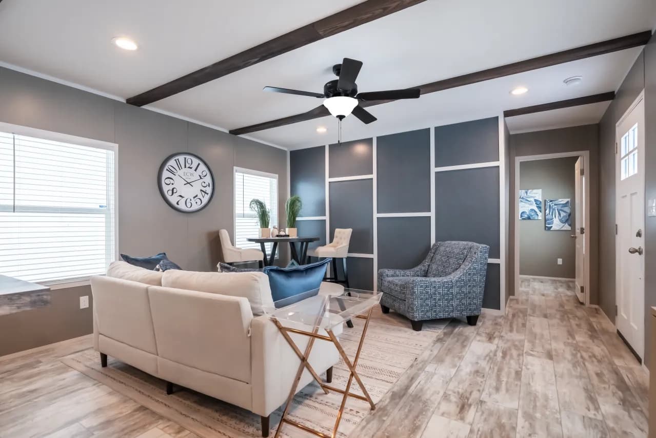 The LIBERTY Living Room. This Manufactured Mobile Home features 3 bedrooms and 2 baths.