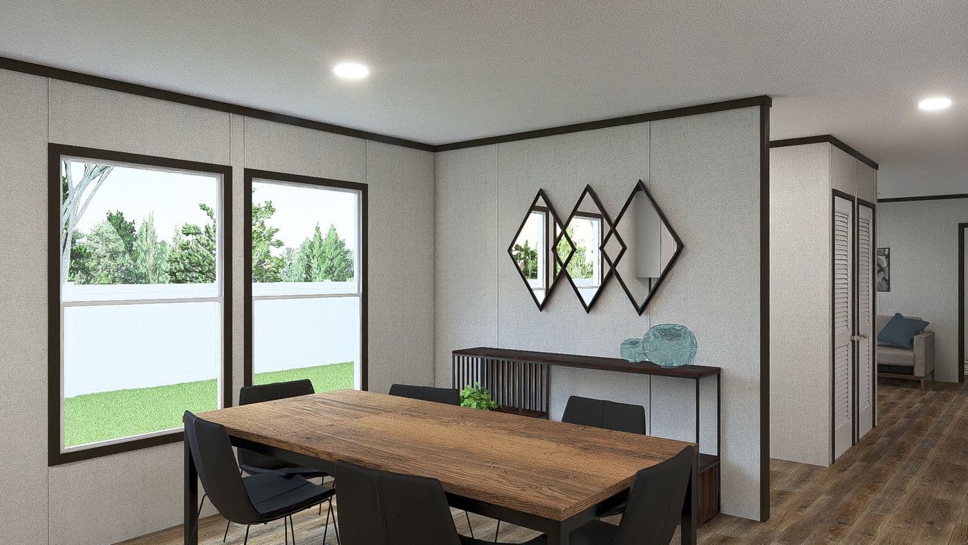 The AMBITION Dining Area. This Manufactured Mobile Home features 4 bedrooms and 2 baths.