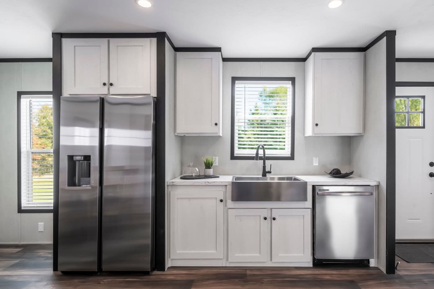The LIL SOUTHERN CHARM Kitchen. This Manufactured Mobile Home features 3 bedrooms and 2 baths.