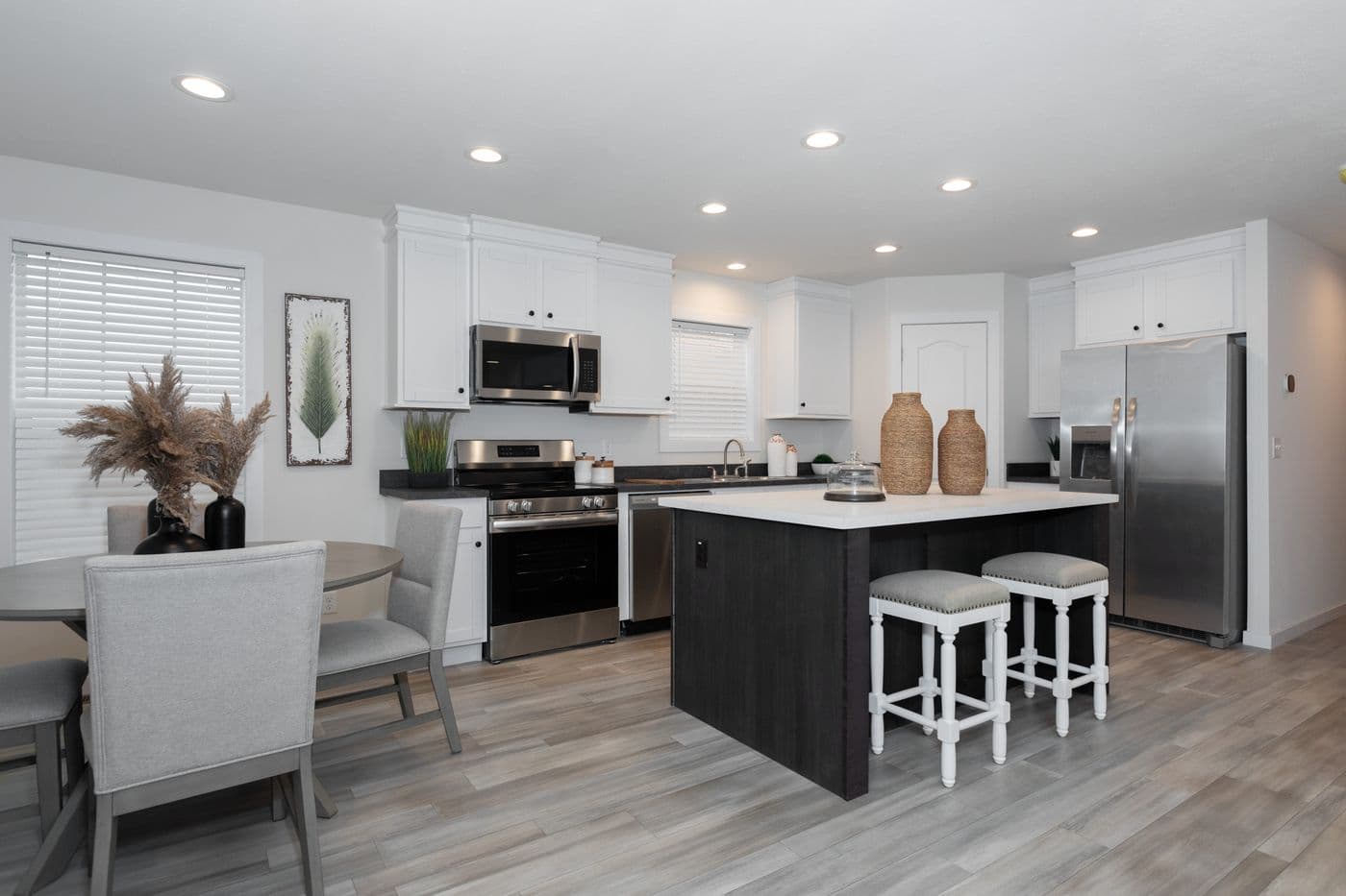 The CENTER ST/5228-MS014-1 SECT Dining Area. This Manufactured Mobile Home features 3 bedrooms and 2 baths.
