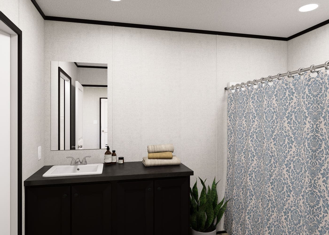 The NORTHSTAR 16X76 Primary Bathroom. This Manufactured Mobile Home features 3 bedrooms and 2 baths.