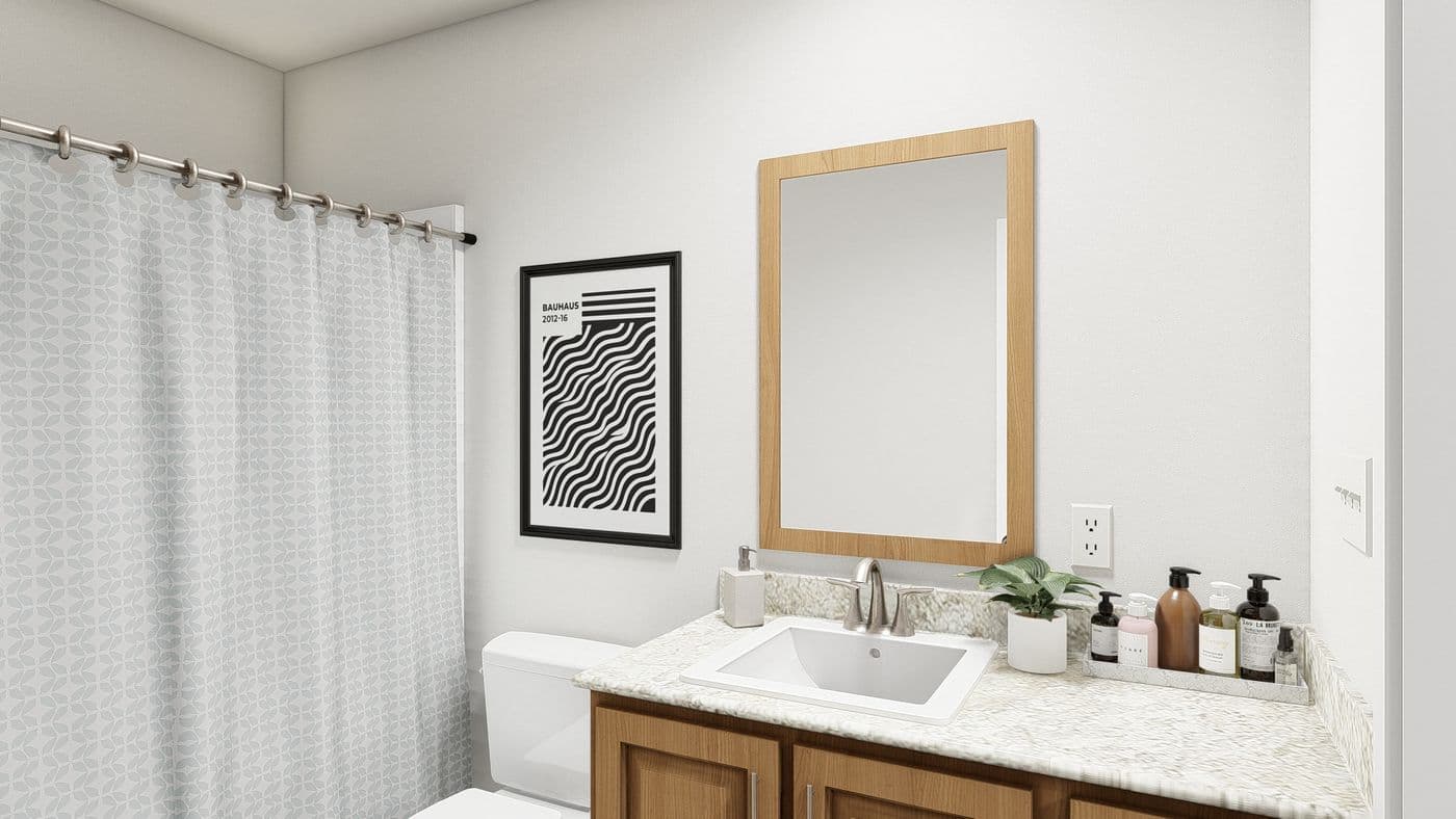 The DRM711F 71' DREAM Guest Bathroom. This Manufactured Mobile Home features 5 bedrooms and 3 baths.