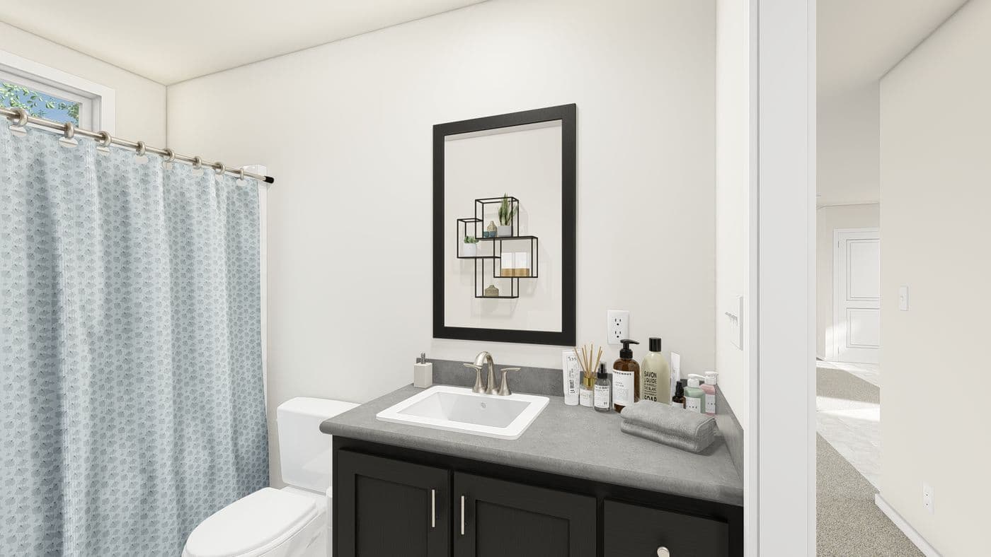 The ING524F WISTERIA GW Guest Bathroom. This Manufactured Mobile Home features 3 bedrooms and 2 baths.