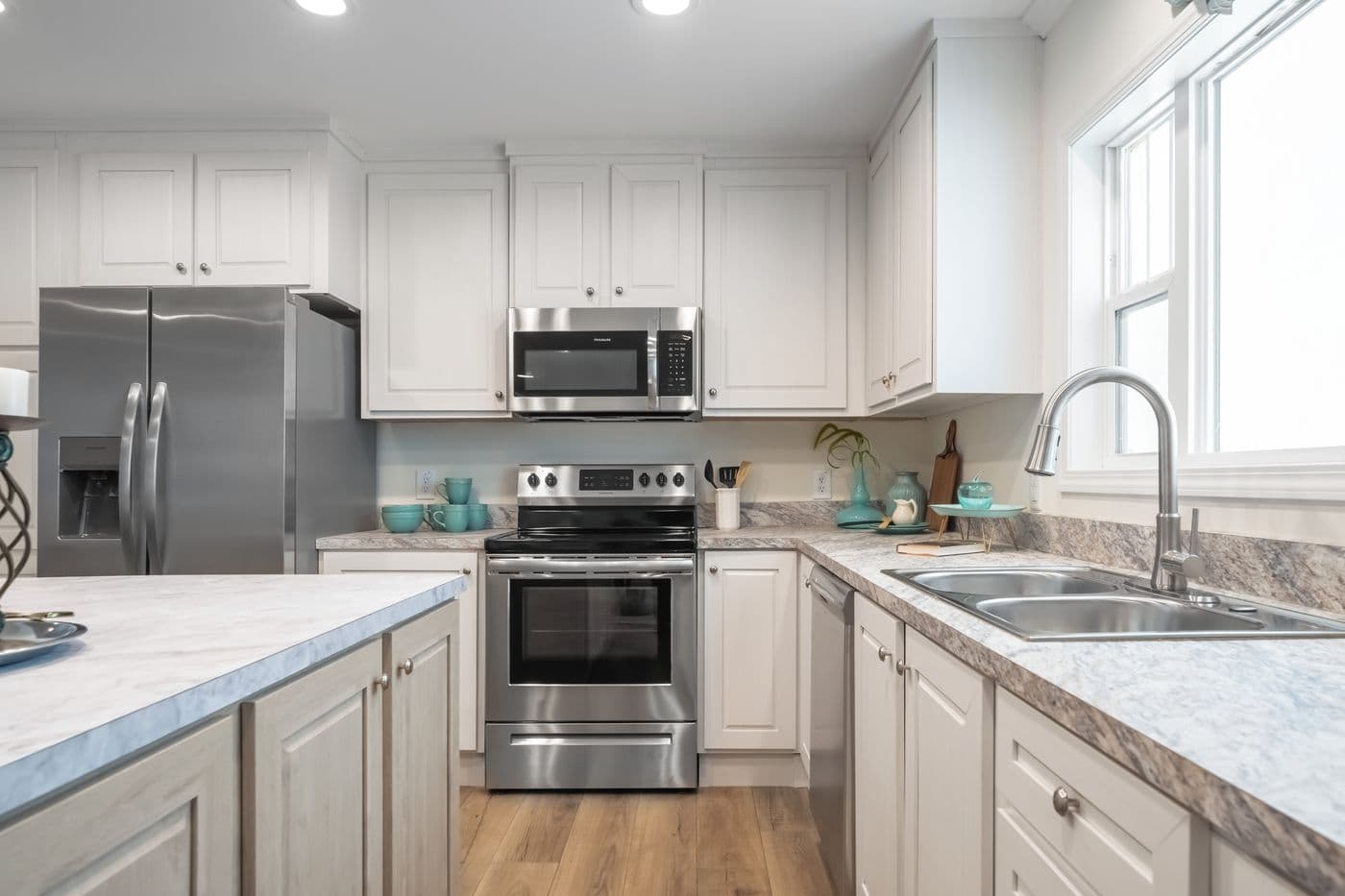 The 4210 "CAROLINA" 5628 Kitchen. This Manufactured Mobile Home features 3 bedrooms and 2 baths.