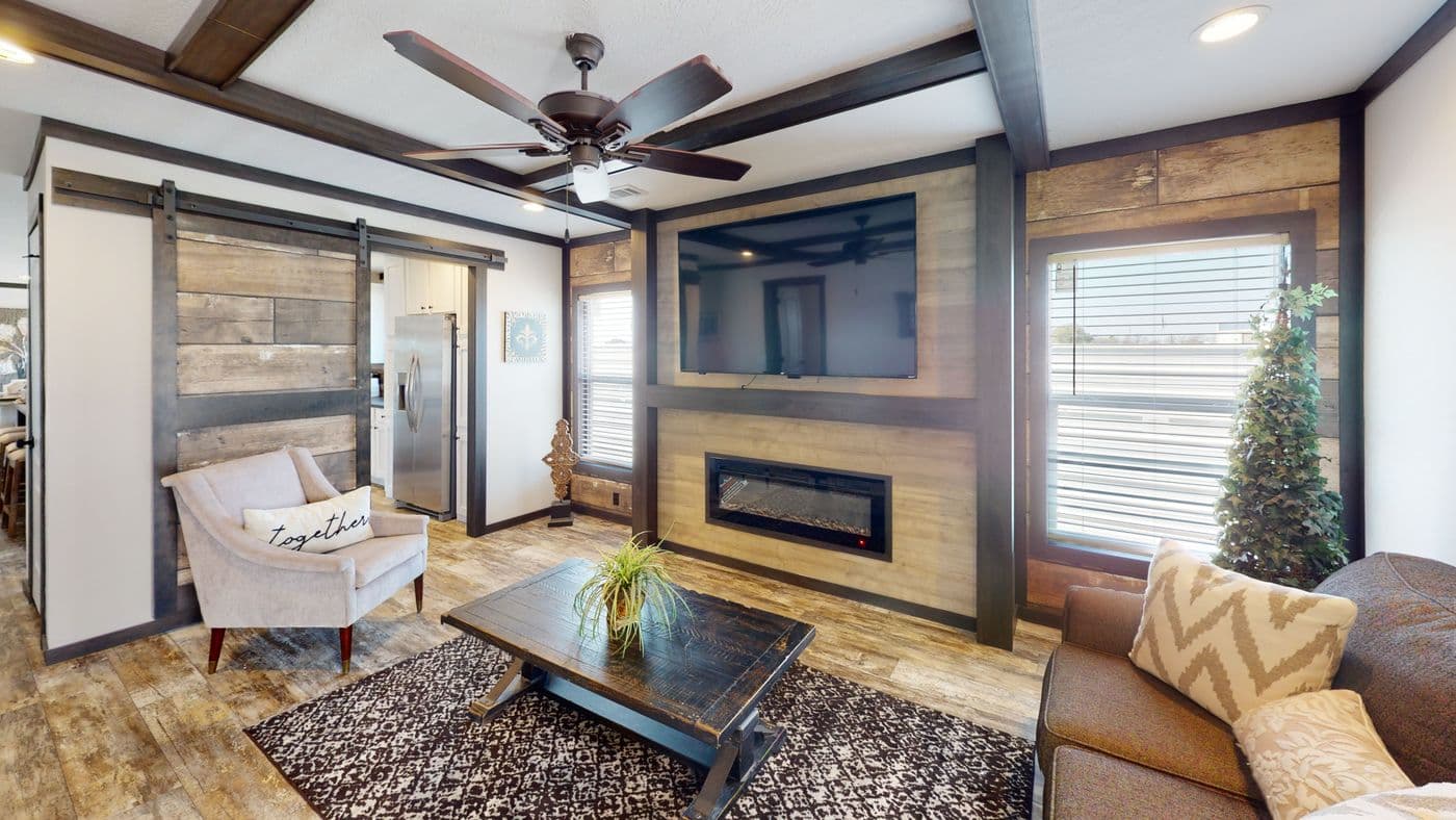 The BOUJEE XL 2 Den. This Manufactured Mobile Home features 4 bedrooms and 3 baths.