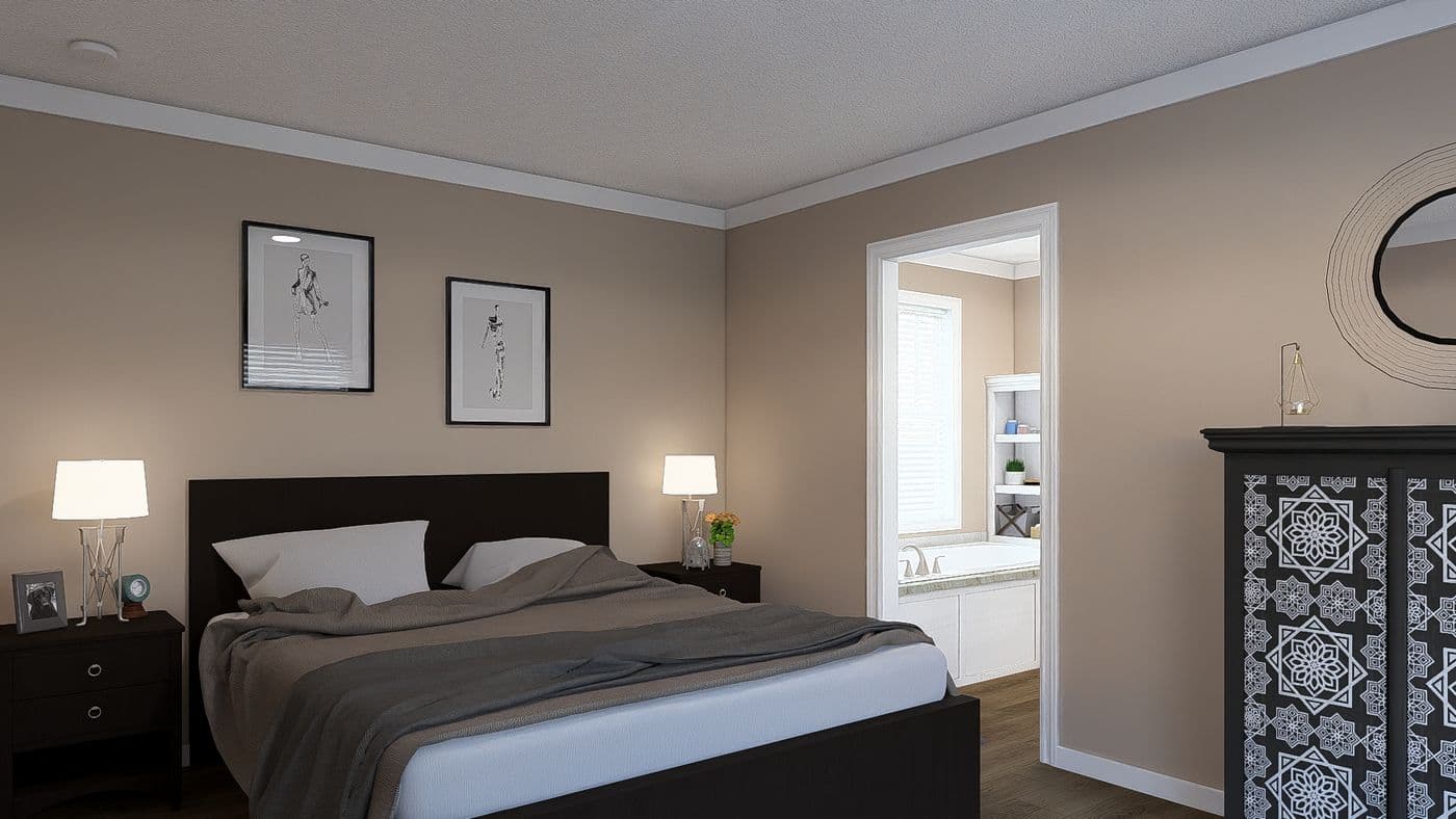 The THE DREAM Primary Bedroom. This Manufactured Mobile Home features 3 bedrooms and 2 baths.