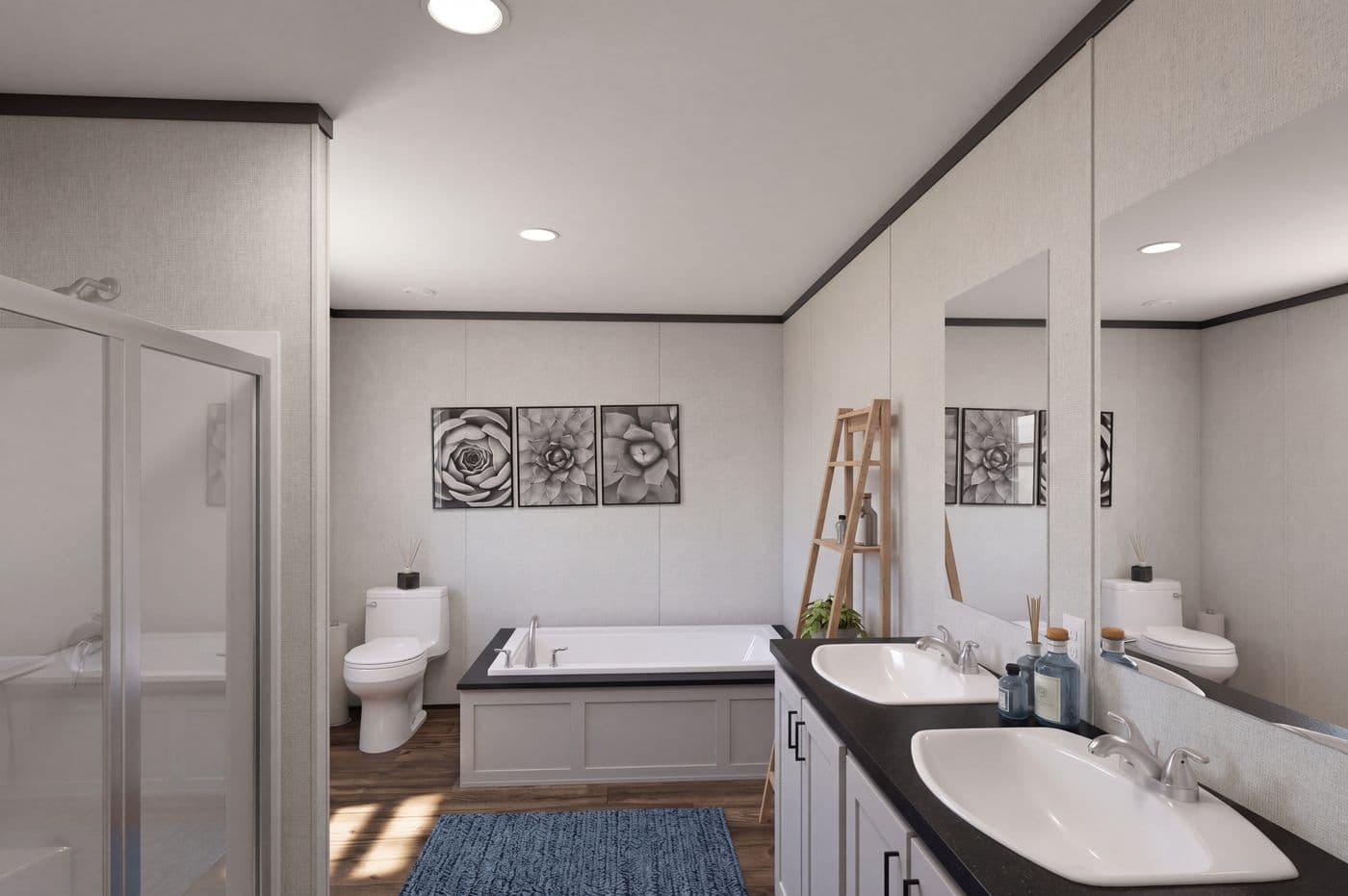 The THE MOUNTAINEER 48 Primary Bathroom. This Manufactured Mobile Home features 3 bedrooms and 2 baths.