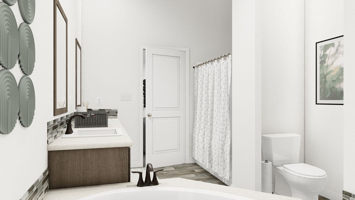 The DRM563F 56' DREAM Primary Bathroom. This Manufactured Mobile Home features 3 bedrooms and 2 baths.