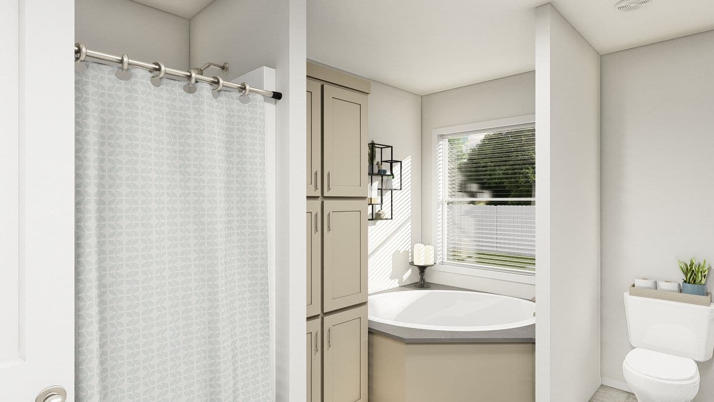 The DRM601F 60' DREAM Primary Bathroom. This Manufactured Mobile Home features 4 bedrooms and 2 baths.