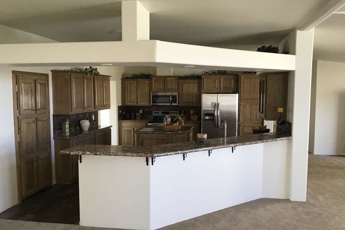 The 2022 COLUMBIA RIVER (NEW) Kitchen. This Manufactured Mobile Home features 3 bedrooms and 2 baths.