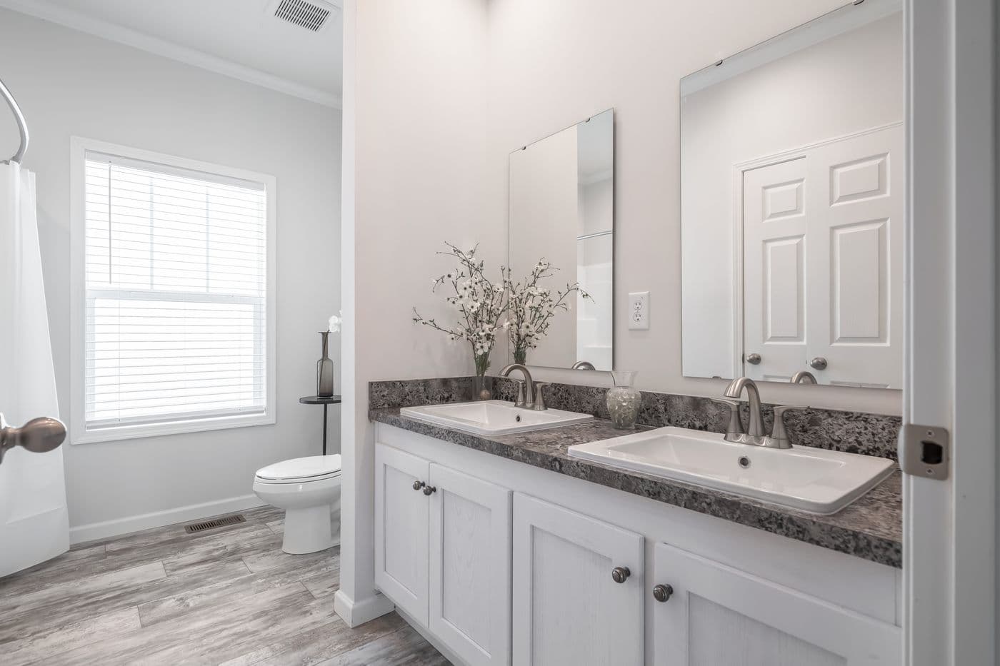 The 4872 ENTERPRISE 32X76 MODULAR Guest Bathroom. This Modular Home features 4 bedrooms and 2 baths.