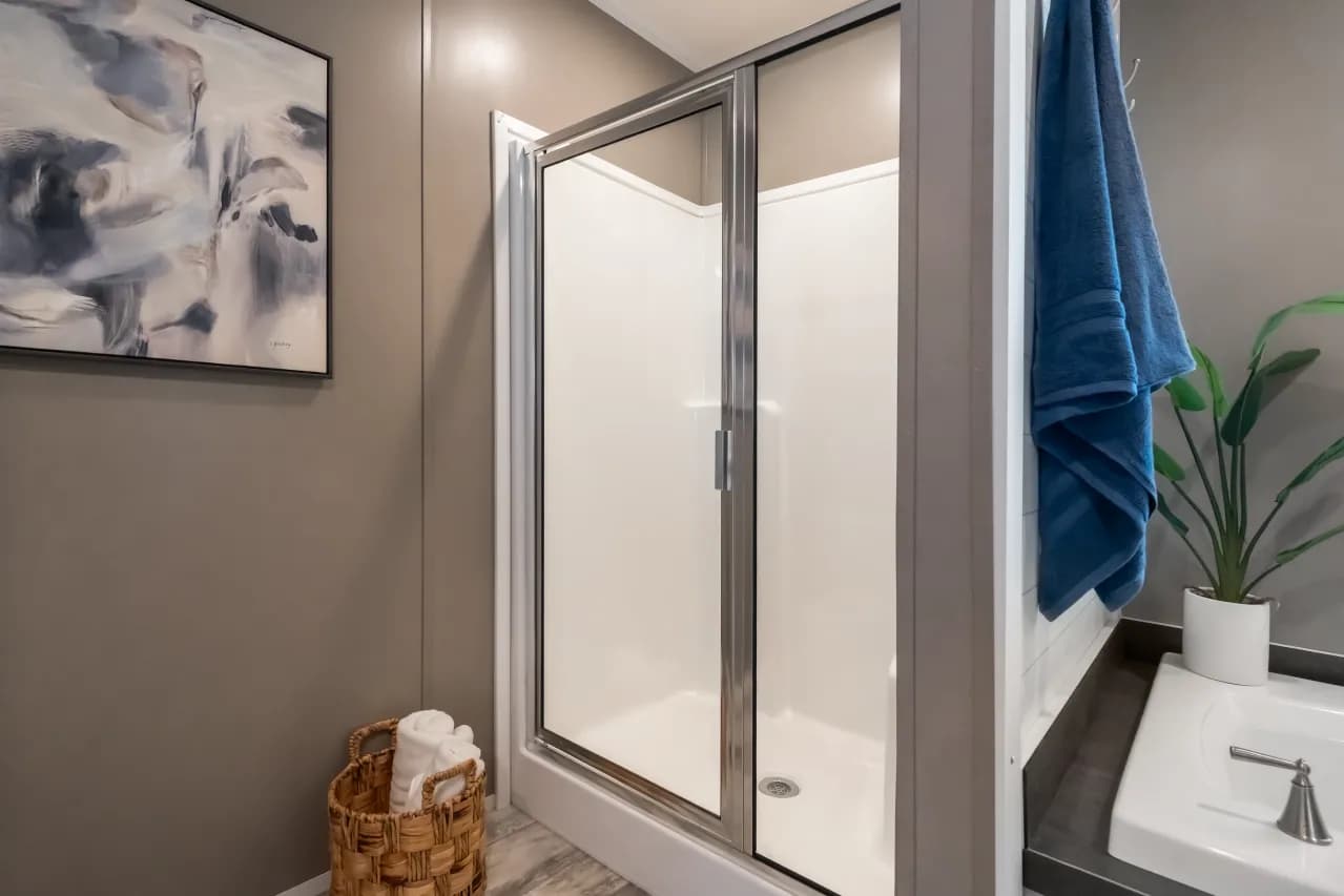 The LIBERTY Primary Bathroom. This Manufactured Mobile Home features 3 bedrooms and 2 baths.