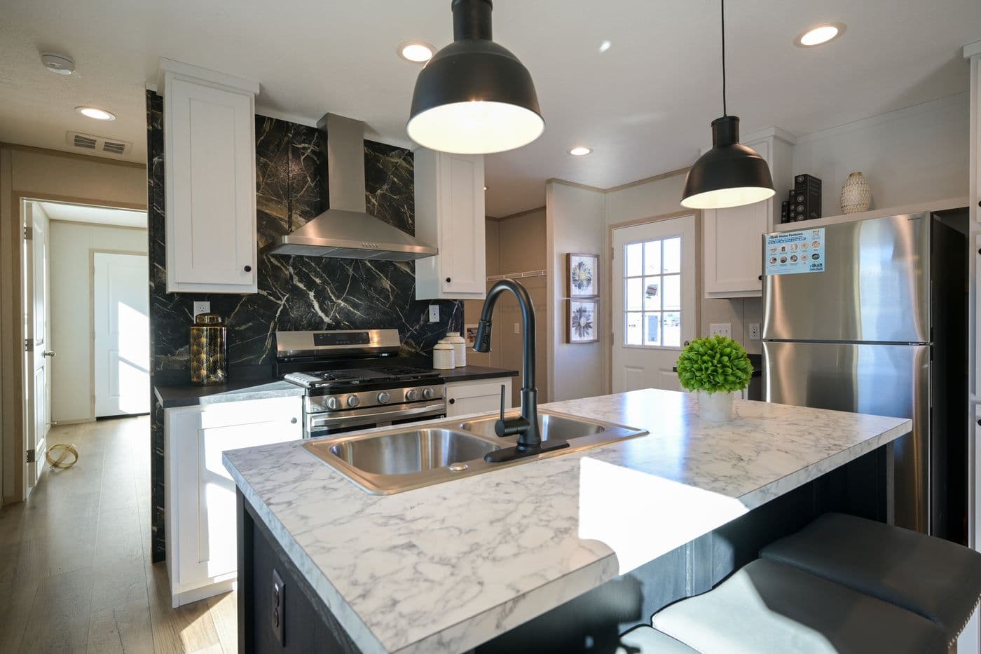 The TIGER'S EYE 7416-456 Kitchen. This Manufactured Mobile Home features 3 bedrooms and 2 baths.