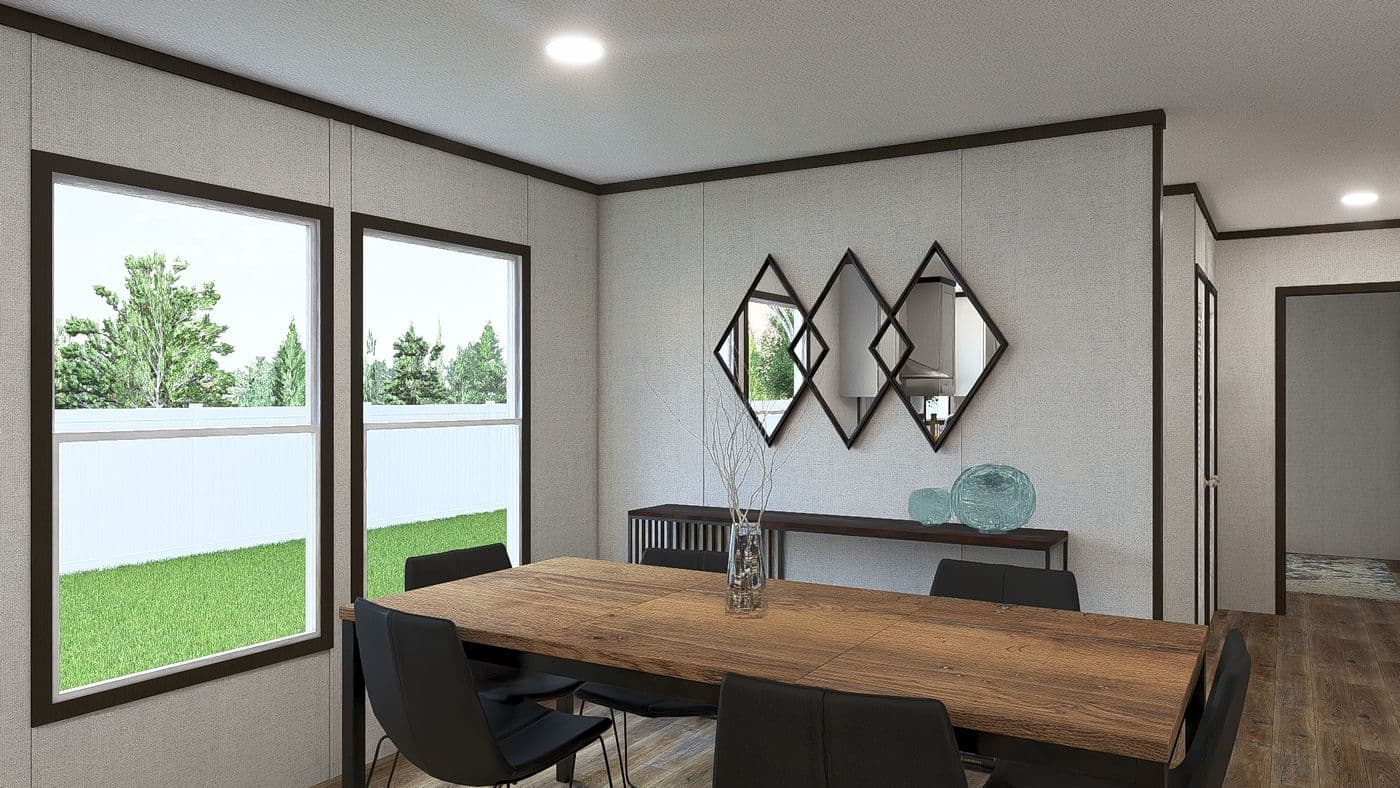 The OCCASION Dining Area. This Manufactured Mobile Home features 4 bedrooms and 2 baths.