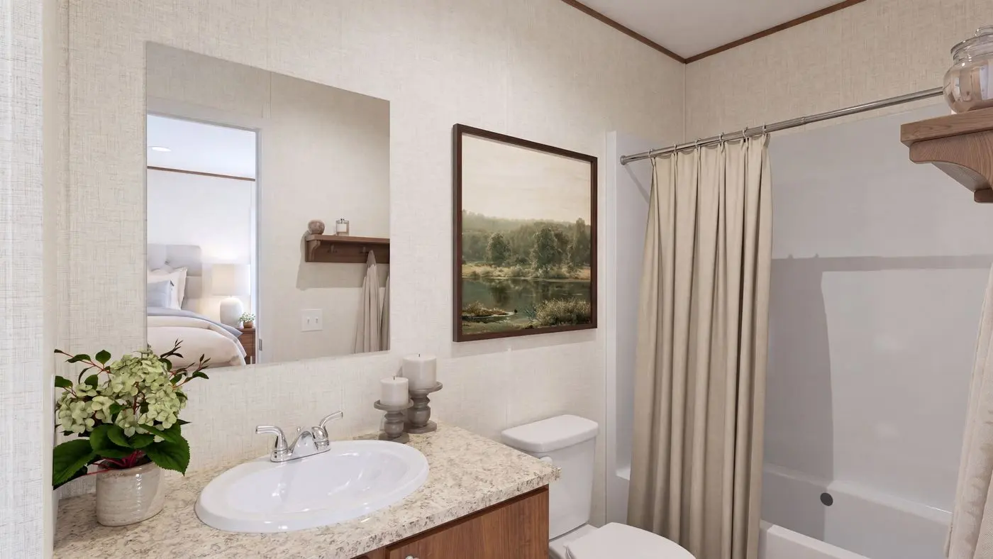 The CYPRESS Guest Bathroom. This Manufactured Mobile Home features 4 bedrooms and 2 baths.