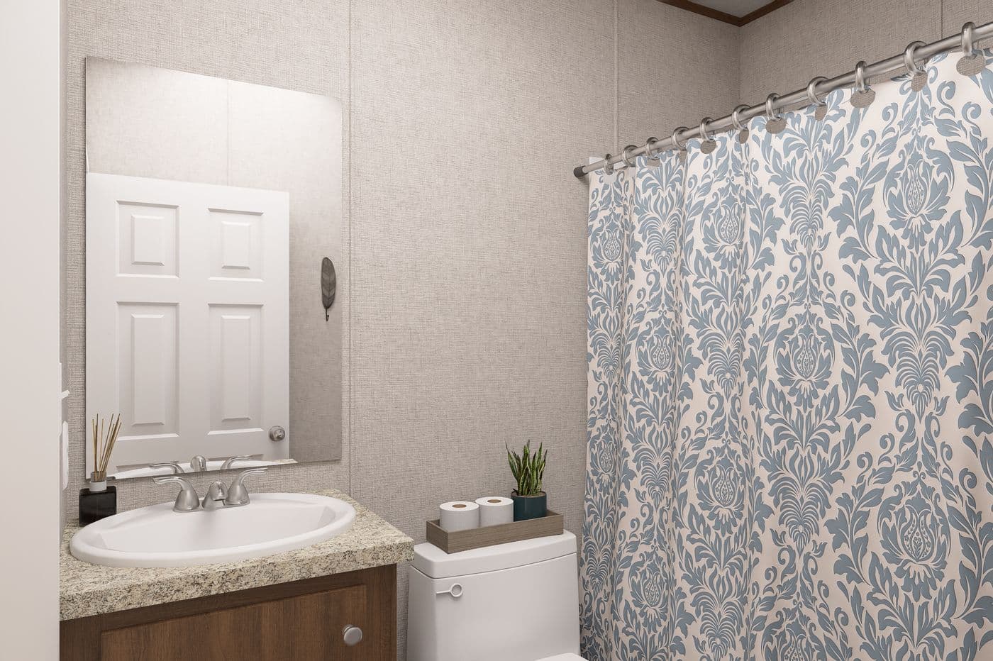 The MAGNOLIA Guest Bathroom. This Manufactured Mobile Home features 3 bedrooms and 2 baths.