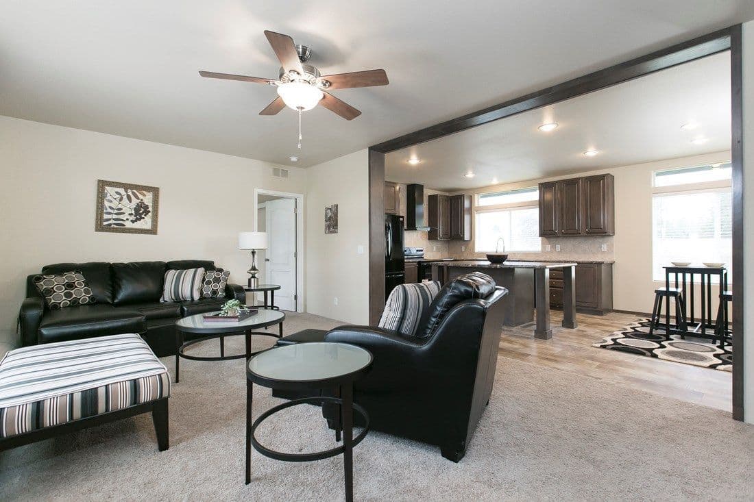 The 2023 COLUMBIA RIVER (NEW) Living Room. This Manufactured Mobile Home features 3 bedrooms and 2 baths.