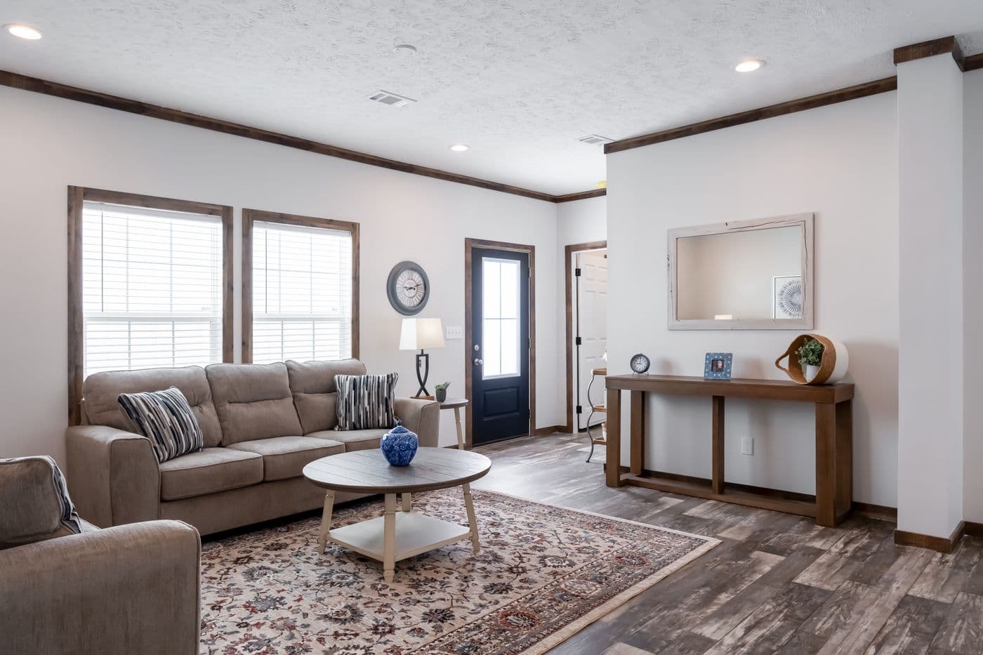 The 3237 THE TYBEE HUD Living Room. This Manufactured Mobile Home features 4 bedrooms and 3 baths.