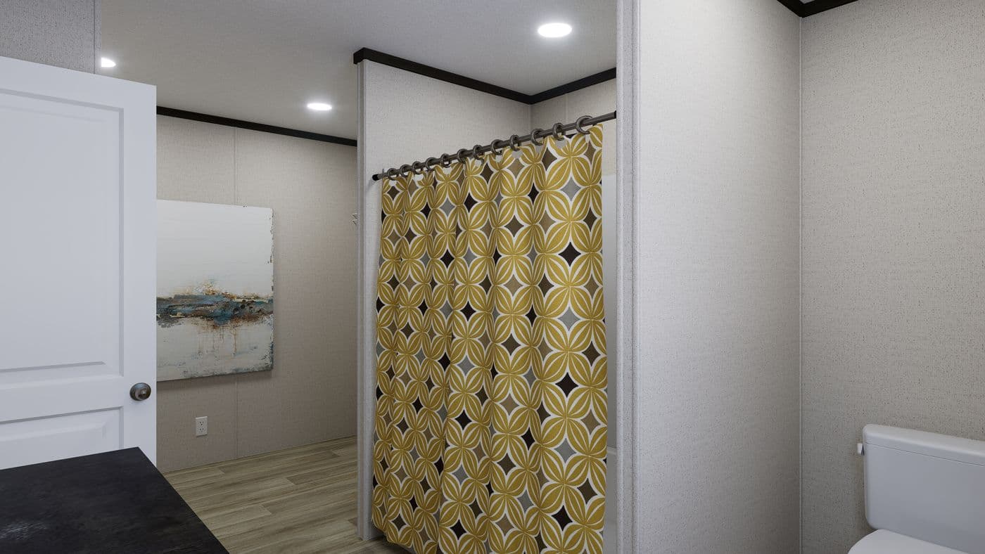 The RALLY Primary Bathroom. This Manufactured Mobile Home features 3 bedrooms and 2 baths.