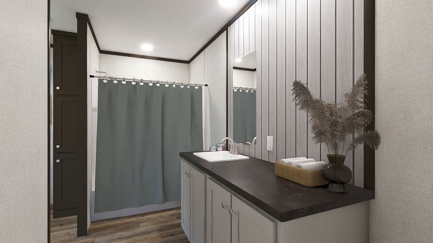 The GLIMPSE Primary Bathroom. This Manufactured Mobile Home features 3 bedrooms and 2 baths.