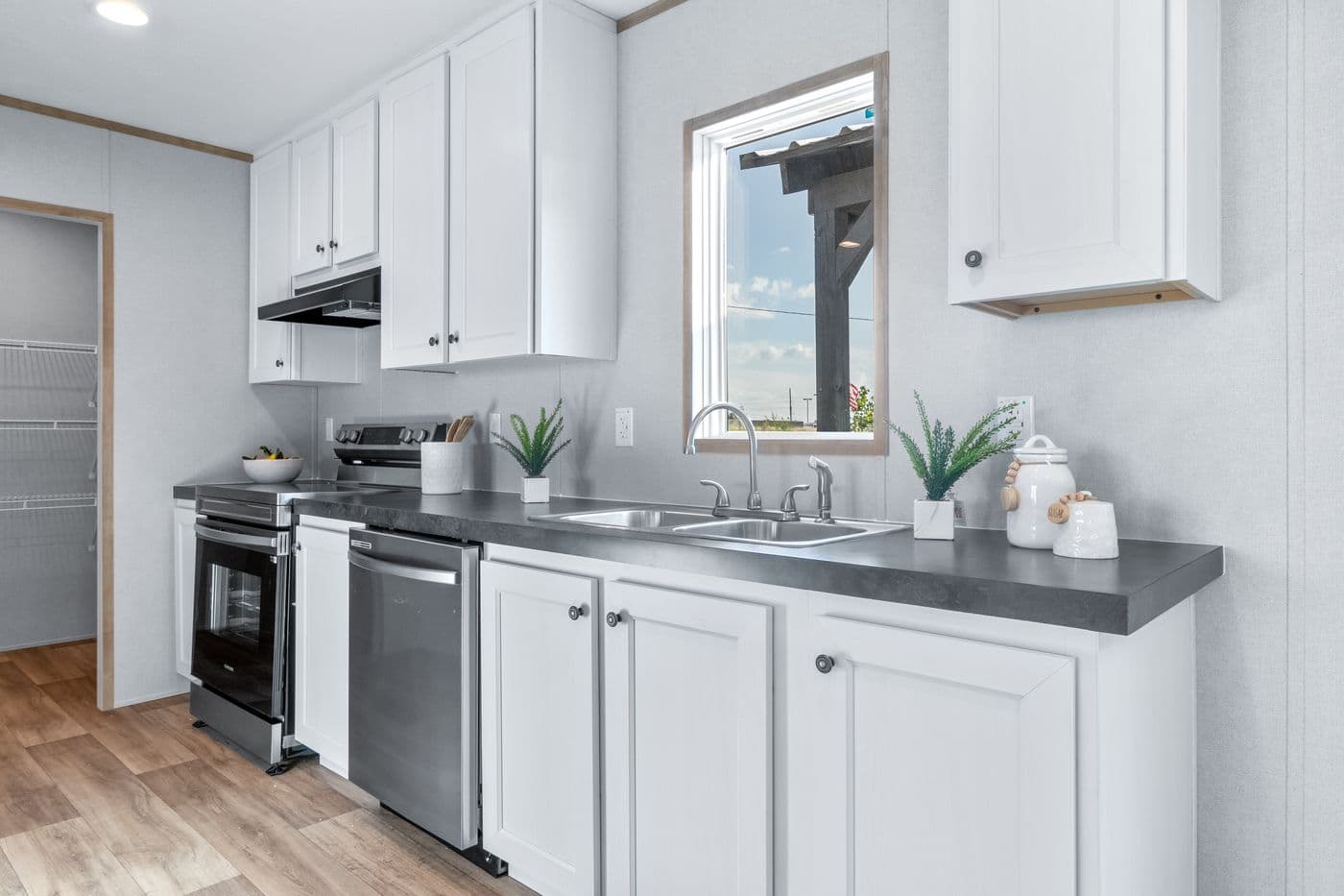 The ASPIRE Kitchen. This Manufactured Mobile Home features 3 bedrooms and 2 baths.