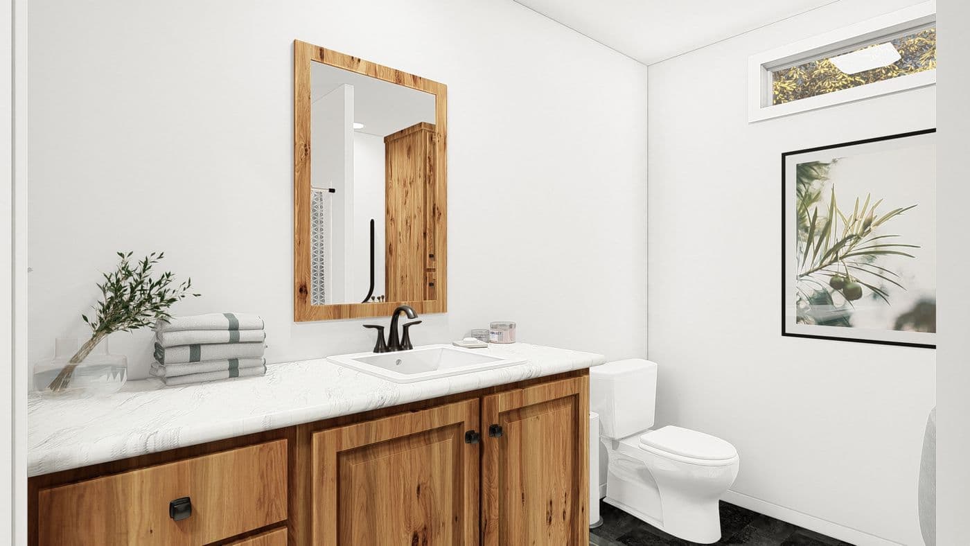 The ING681F EUCALYPTUS GW Guest Bathroom. This Manufactured Mobile Home features 3 bedrooms and 2 baths.