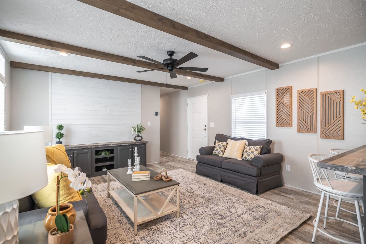 The ANNIVERSARY CHOICE Living Room. This Manufactured Mobile Home features 3 bedrooms and 2 baths.