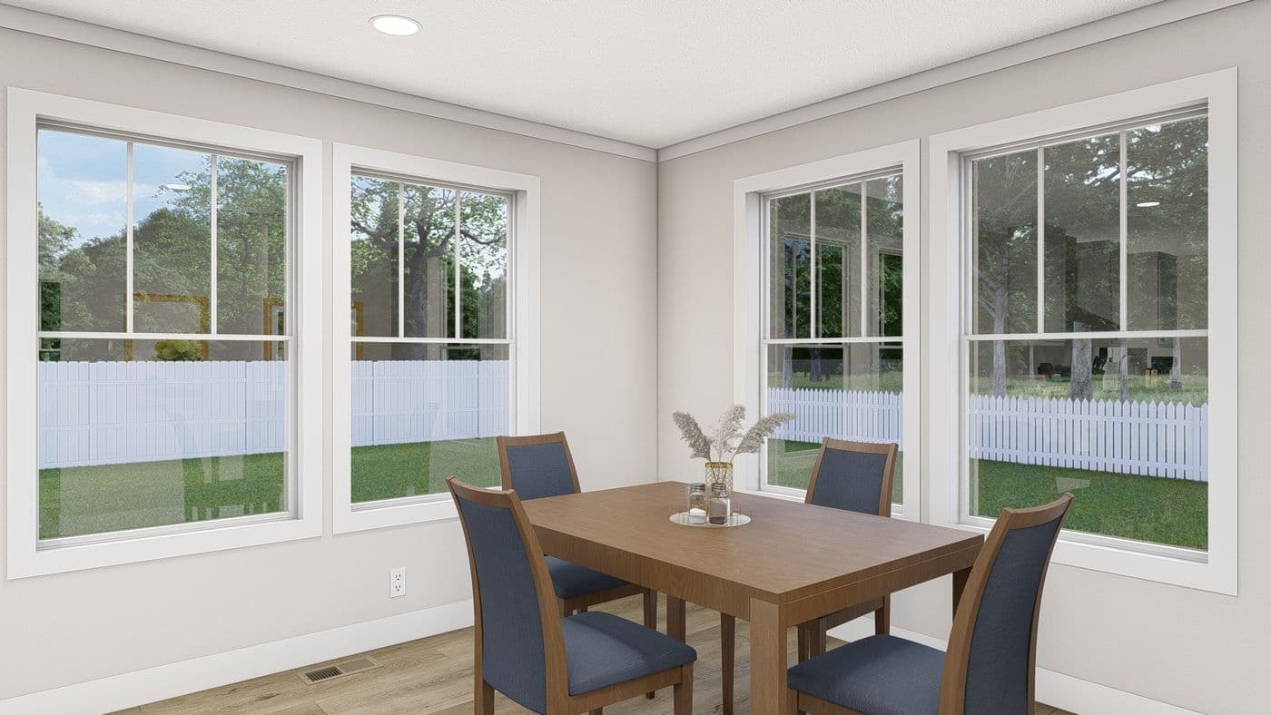 The WHOLE LOTTA LOVE Dining Room. This Manufactured Mobile Home features 3 bedrooms and 2 baths.
