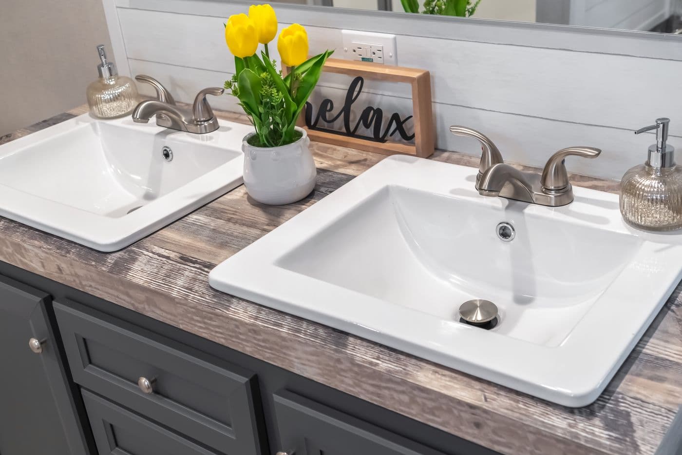 The ANNIVERSARY CHOICE Primary Bathroom. This Manufactured Mobile Home features 3 bedrooms and 2 baths.