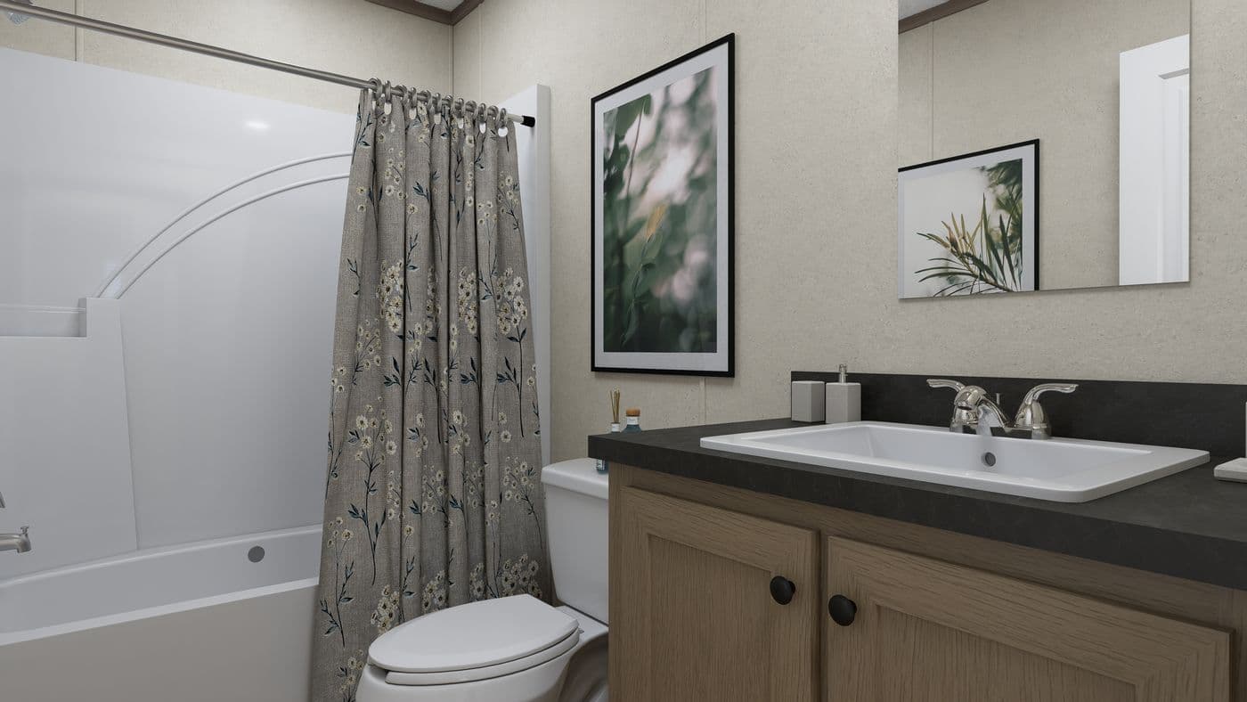 The 5628-CC52 COMPASS 56 Guest Bathroom. This Manufactured Mobile Home features 3 bedrooms and 2 baths.