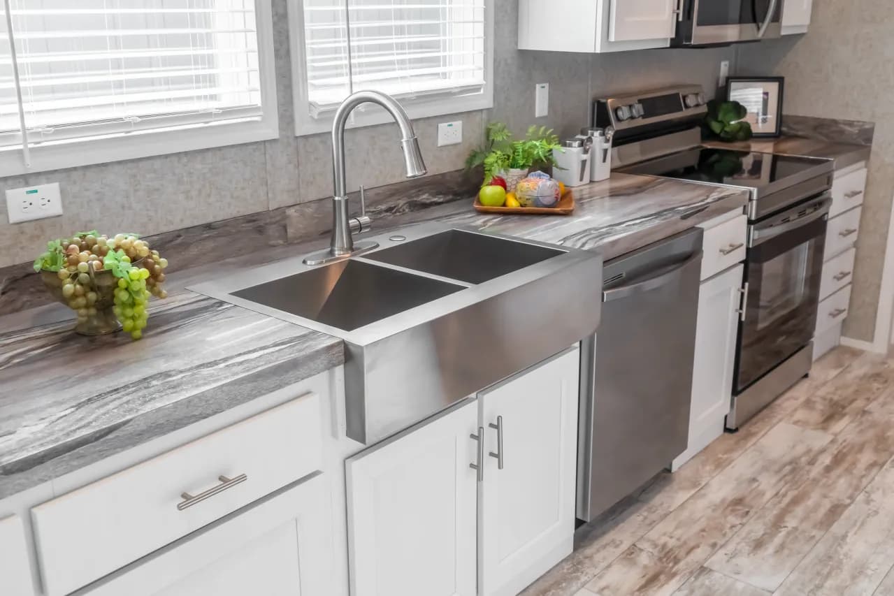 The NUMBER ONE Exterior. This Manufactured Mobile Home features 3 bedrooms and 2 baths.