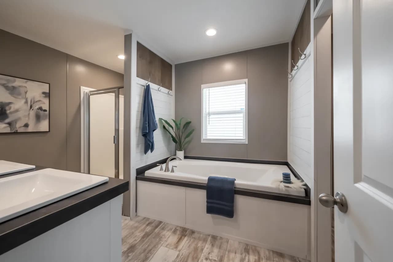 The LIBERTY Primary Bathroom. This Manufactured Mobile Home features 3 bedrooms and 2 baths.