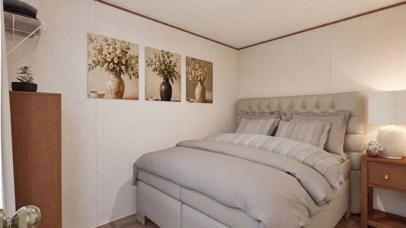 The BUTTERCUP Primary Bedroom. This Manufactured Mobile Home features 1 bedroom and 1 bath.