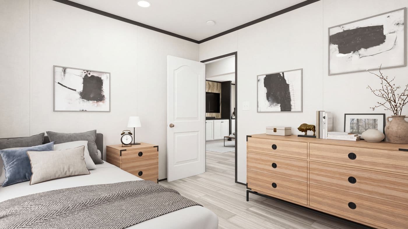 The THE MOUNTAINEER 56 Bedroom. This Manufactured Mobile Home features 3 bedrooms and 2 baths.