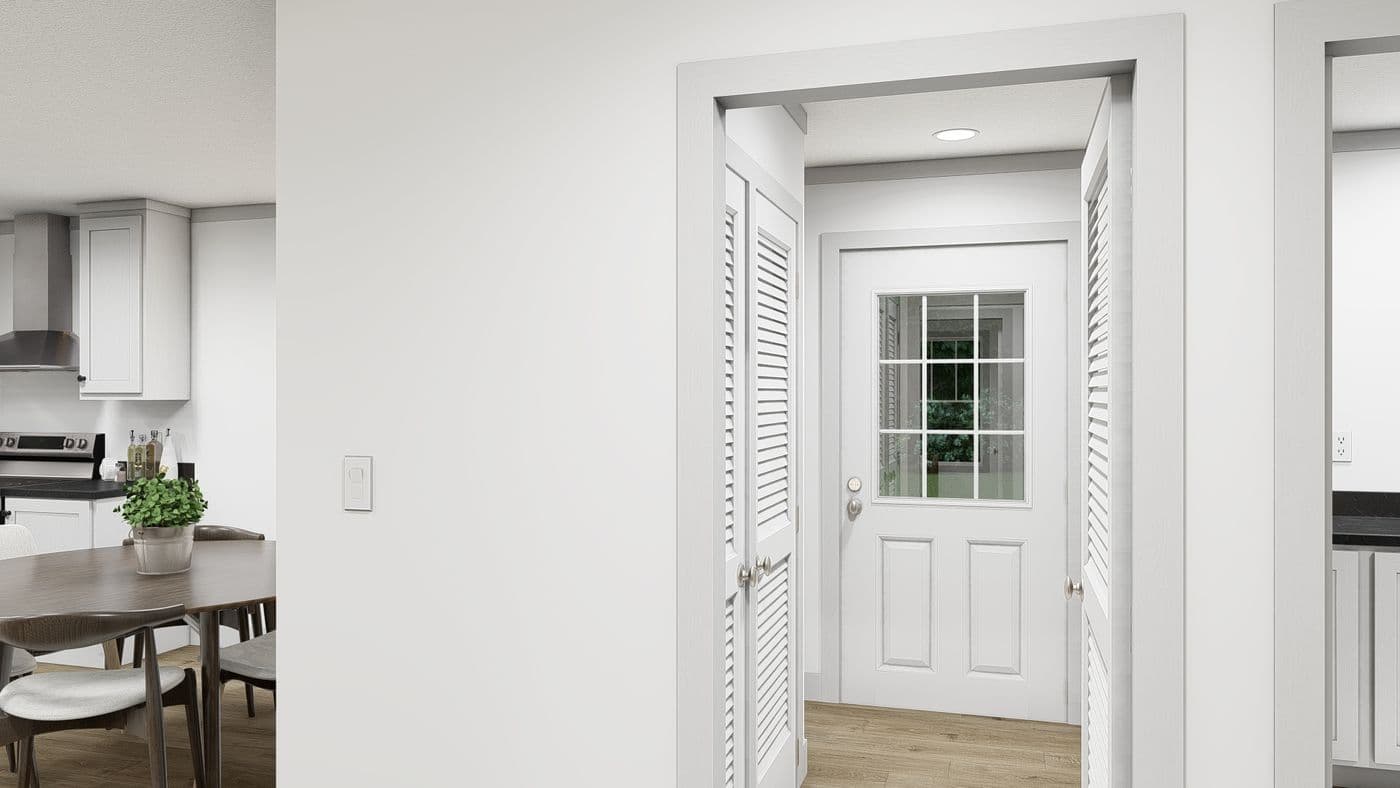 The WONDERFUL WORLD Foyer. This Manufactured Mobile Home features 3 bedrooms and 2 baths.