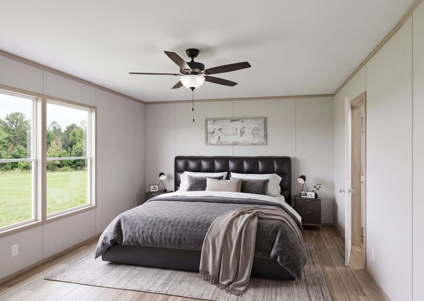 The THE MOUNTAINEER 76 Primary Bedroom. This Manufactured Mobile Home features 4 bedrooms and 2 baths.