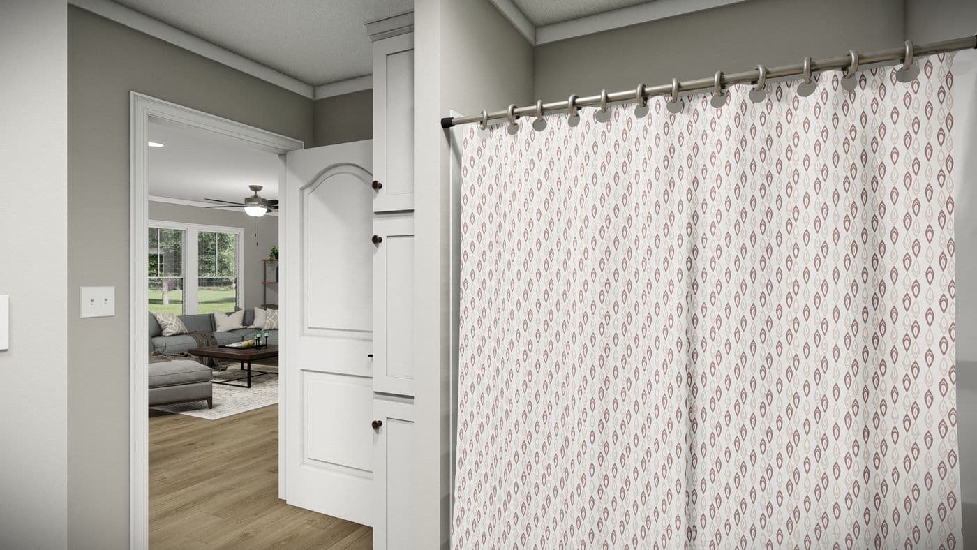 The THE WASHINGTON Guest Bathroom. This Manufactured Mobile Home features 3 bedrooms and 2 baths.