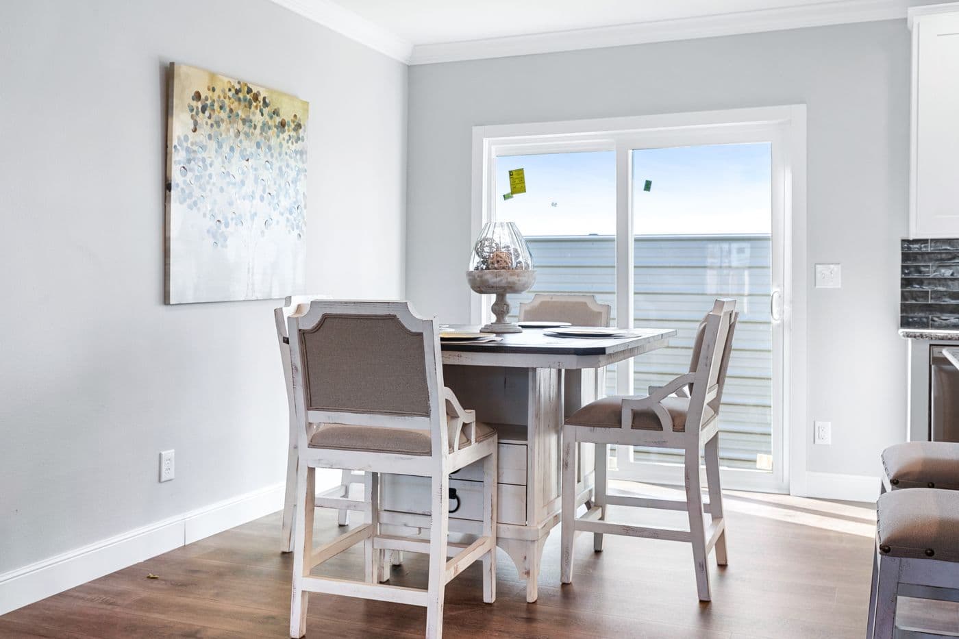 The THE FUJI Dining Room. This Manufactured Mobile Home features 4 bedrooms and 3 baths.