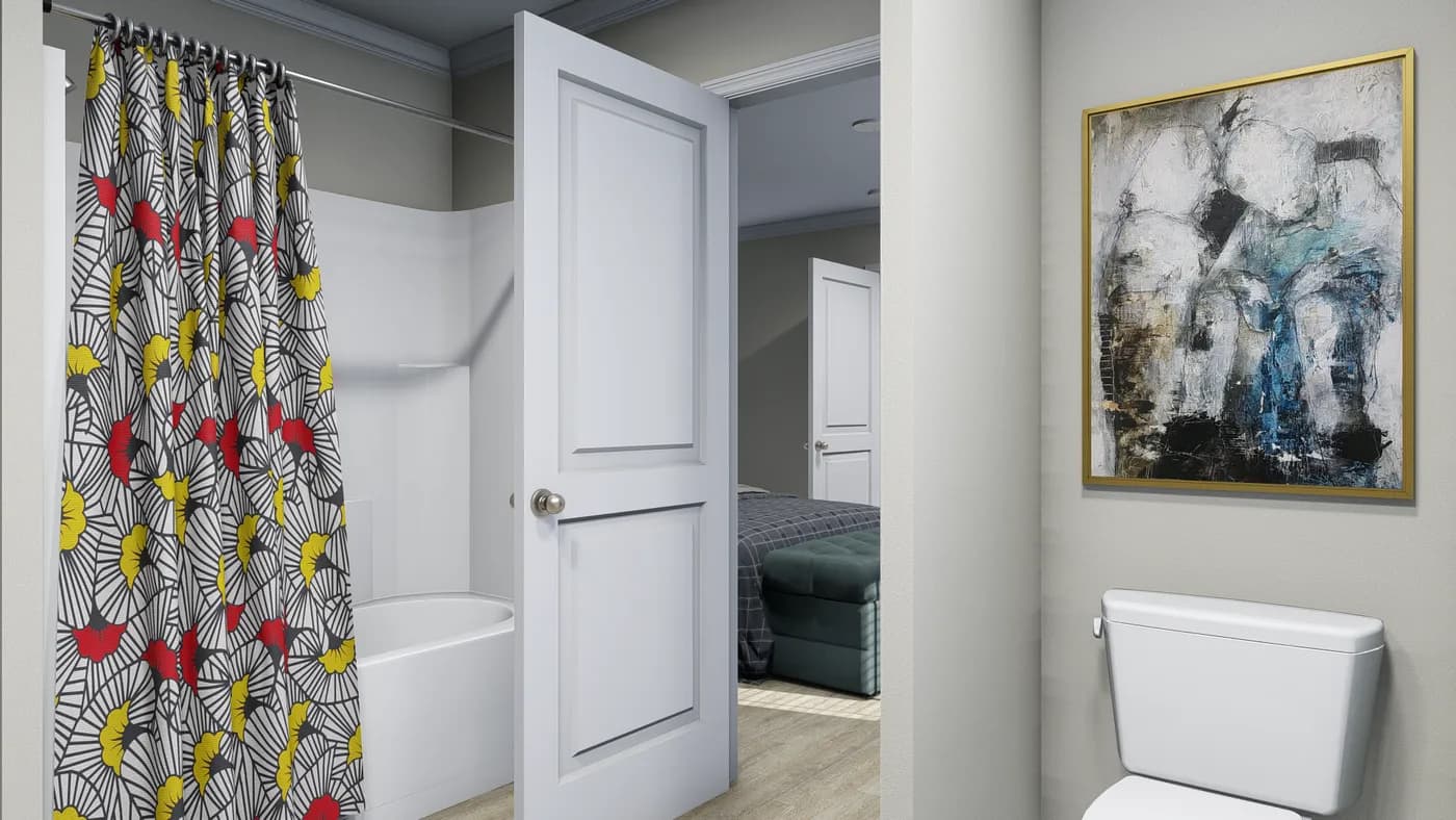 The 7010 "YADKIN" 7616 Primary Bathroom. This Manufactured Mobile Home features 3 bedrooms and 2 baths.