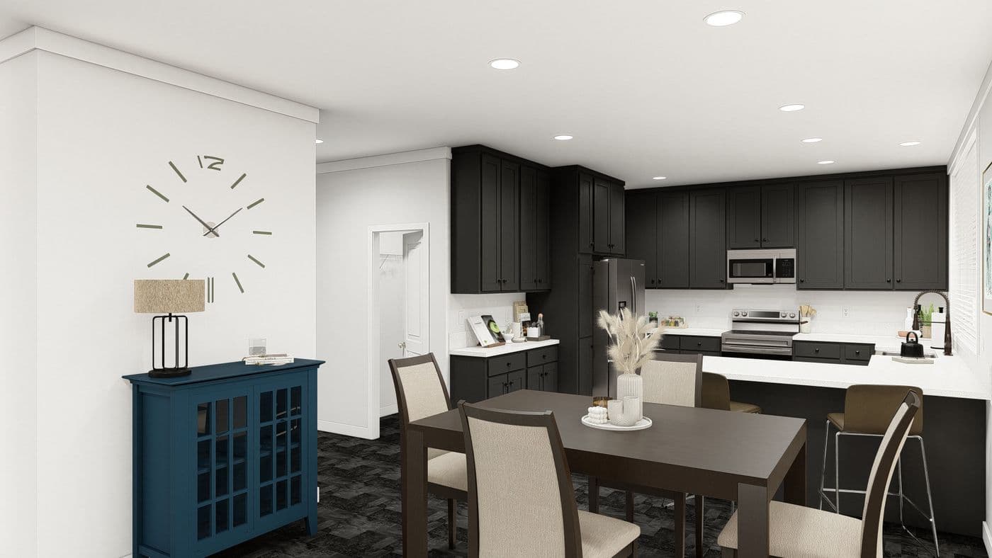 The ING621K TAMARACK GW Dining Area. This Manufactured Mobile Home features 3 bedrooms and 2 baths.