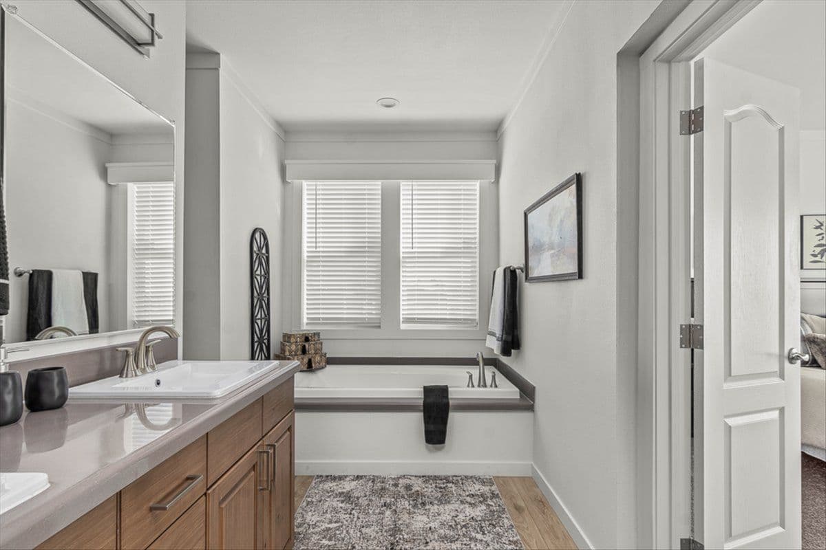 The TU3076A MEGA TUNDRA Primary Bathroom. This Manufactured Mobile Home features 4 bedrooms and 2 baths.