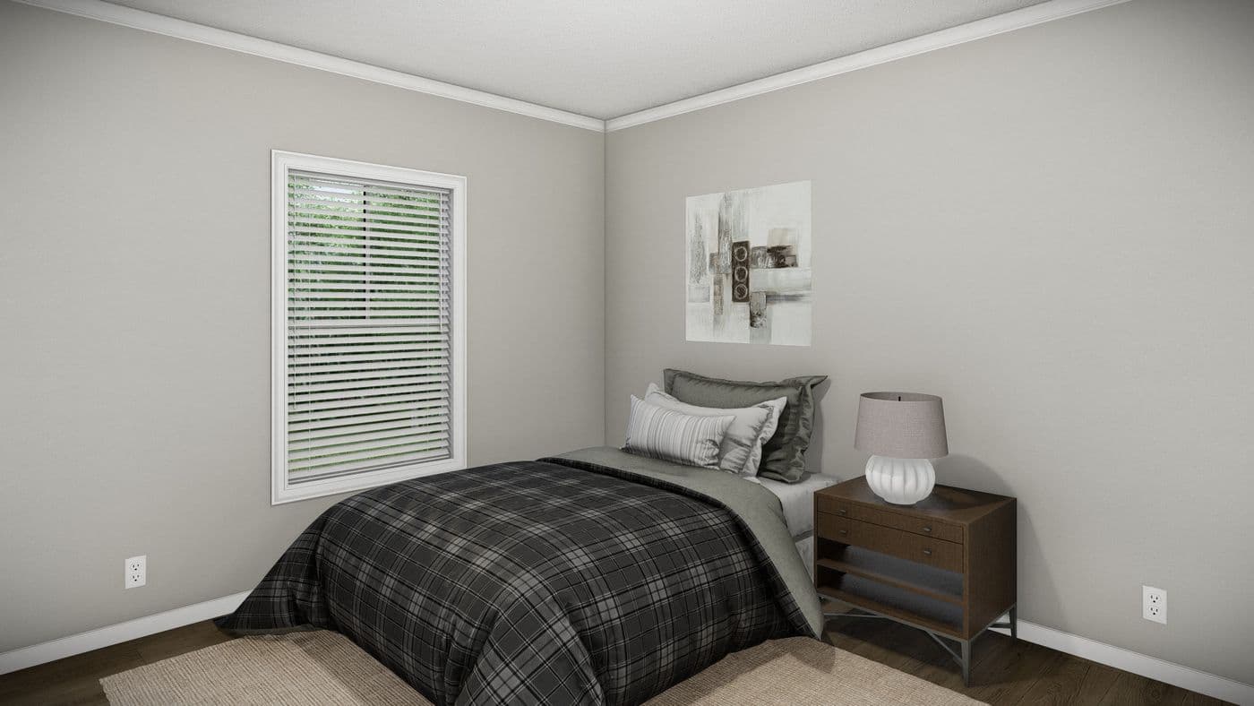The HUXTON II Guest Bedroom. This Manufactured Mobile Home features 4 bedrooms and 2 baths.