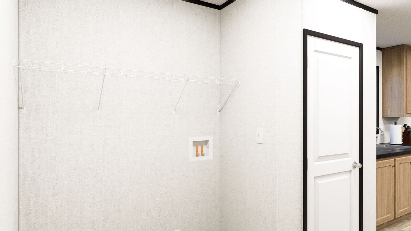 The SOLACE Utility Room. This Manufactured Mobile Home features 4 bedrooms and 2 baths.