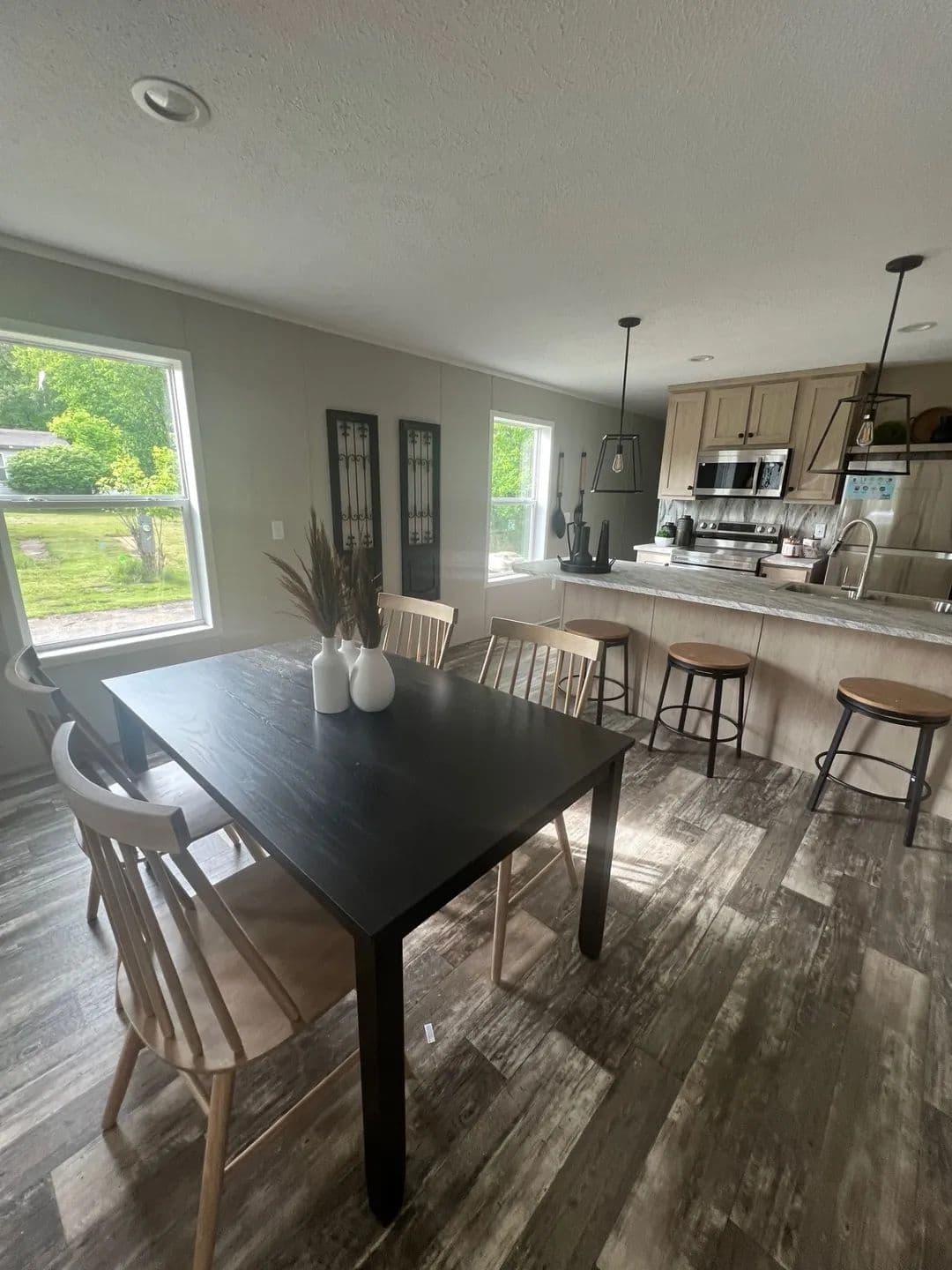 The JADE Dining Area. This Manufactured Mobile Home features 2 bedrooms and 1 bath.